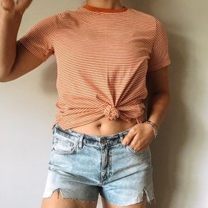 Red and white striped cotton shirt.